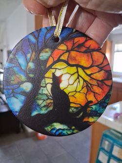 Black  Cat on limb glass ornament