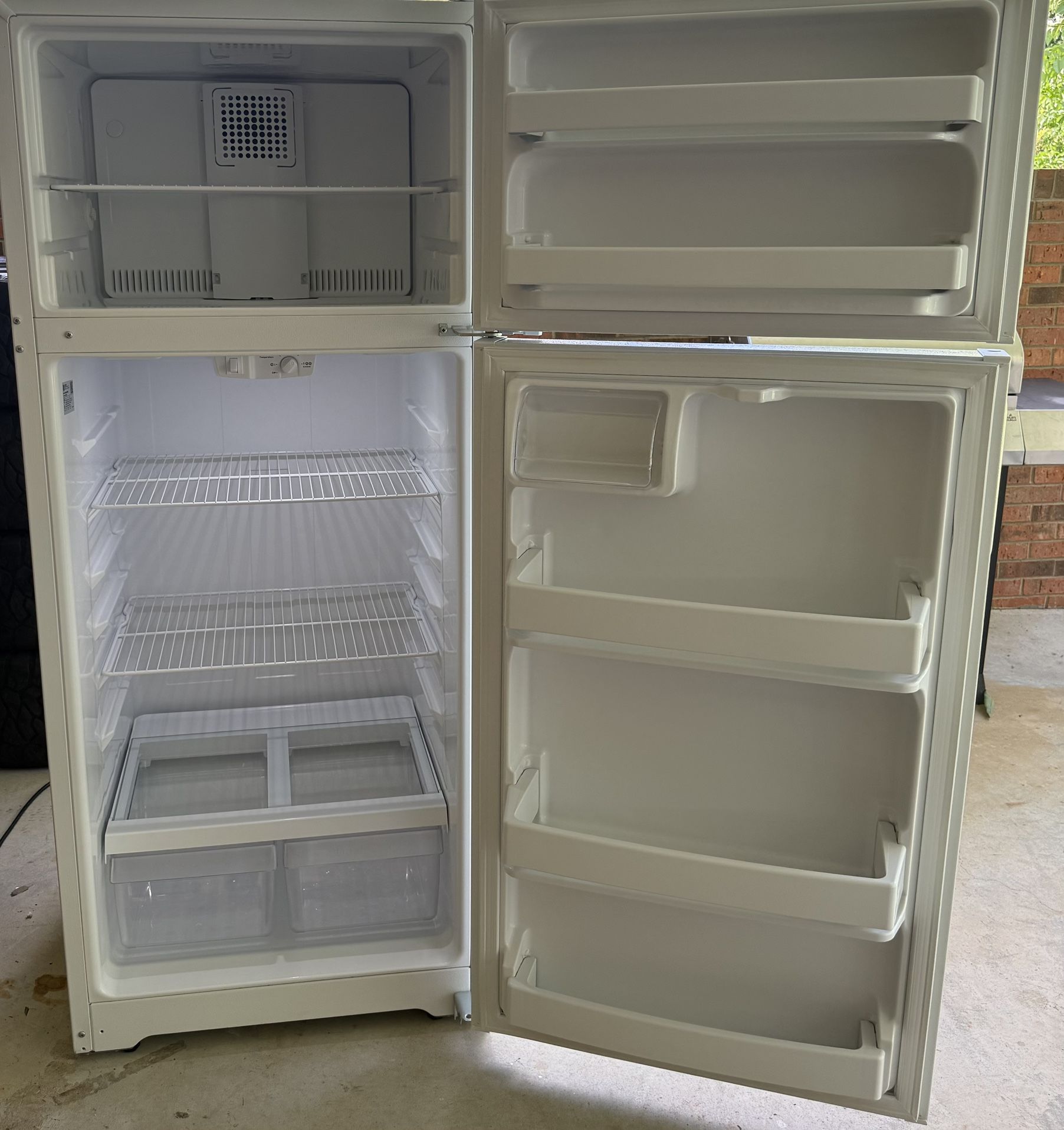 White Refrigerator In Great Shape.