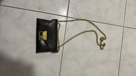 Black and gold purse