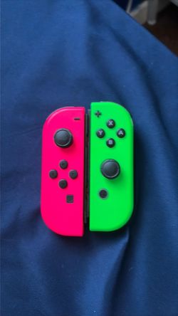Nintendo green and pink controllers
