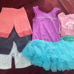Gymnastics Bundle With 2 Rashguards And A Tutu Skirt For Girls Ages 6-7. Take All For Price Listed. No Lower. Firm On Price 