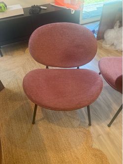 Modern chairs (light burgundy in color) sold as a set