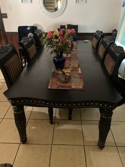 Black hardwood extension dinner table