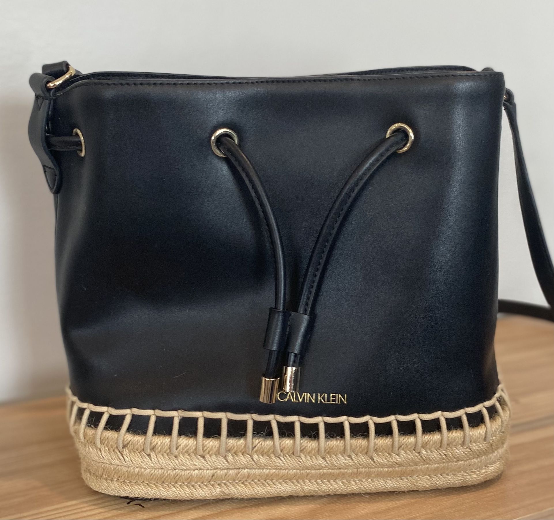 Leather bucket Calvin Klein Gabrianna bag with espadrille trim $35