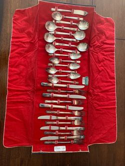 Old silver plated flatware set