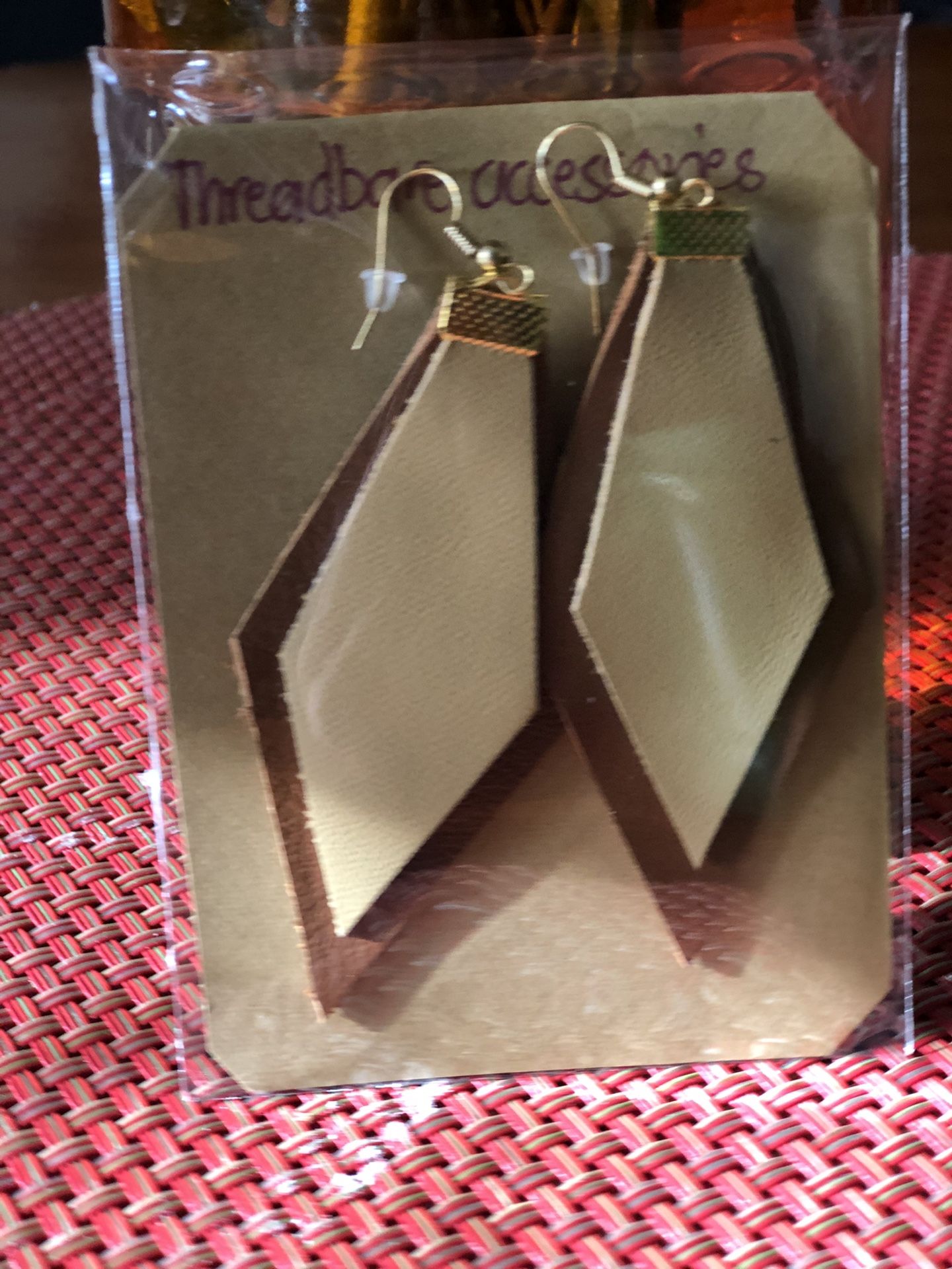 Leather earrings perfect for Christmas gifts.