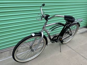 Schwinn Beach Cruiser “Legacy” Silver and Black with cargo rack and legal lights Front and Rear.