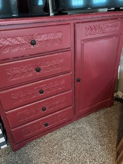 Red distressed dresser