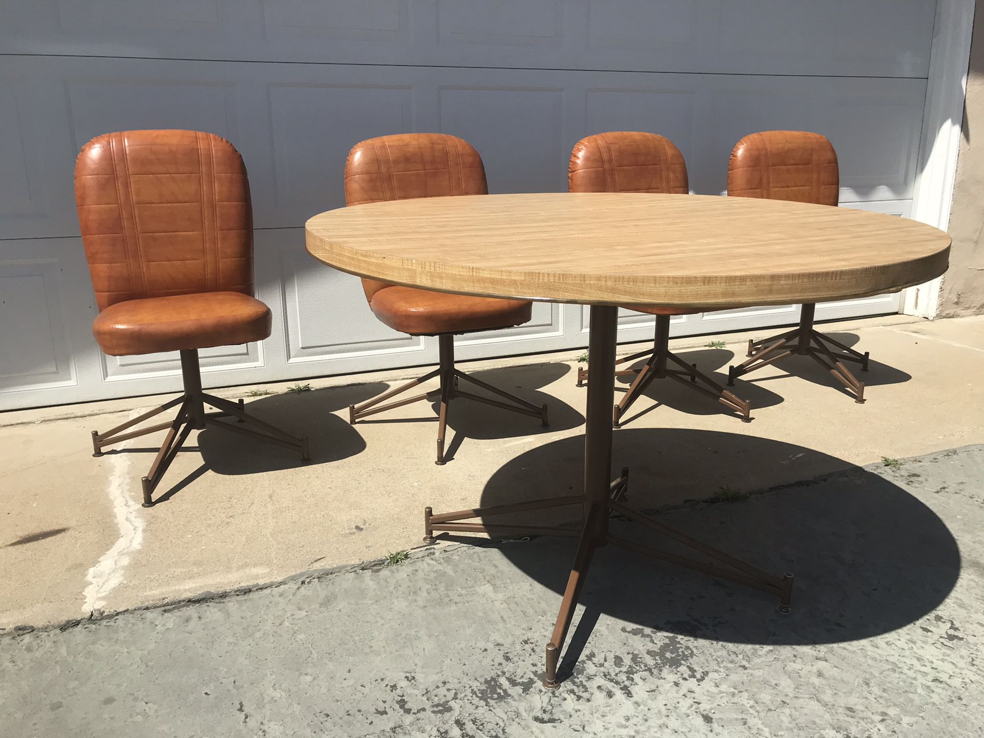 Vintage mid century round table with matching chairs