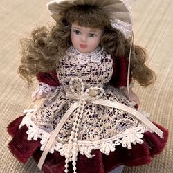 German Porcelain Doll with Burgundy Velvet Dress & Hat 