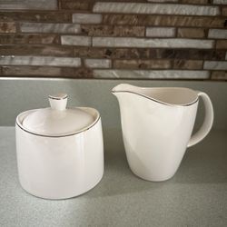 LIKE NEW PIER 1 WHITE WITH SILVER TRIM SUGAR AND CREAMER SET