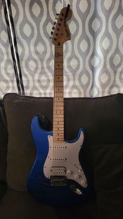 2 Guitars Fender Electric Acoustic with built in tuner and Fender Squier Strat.
