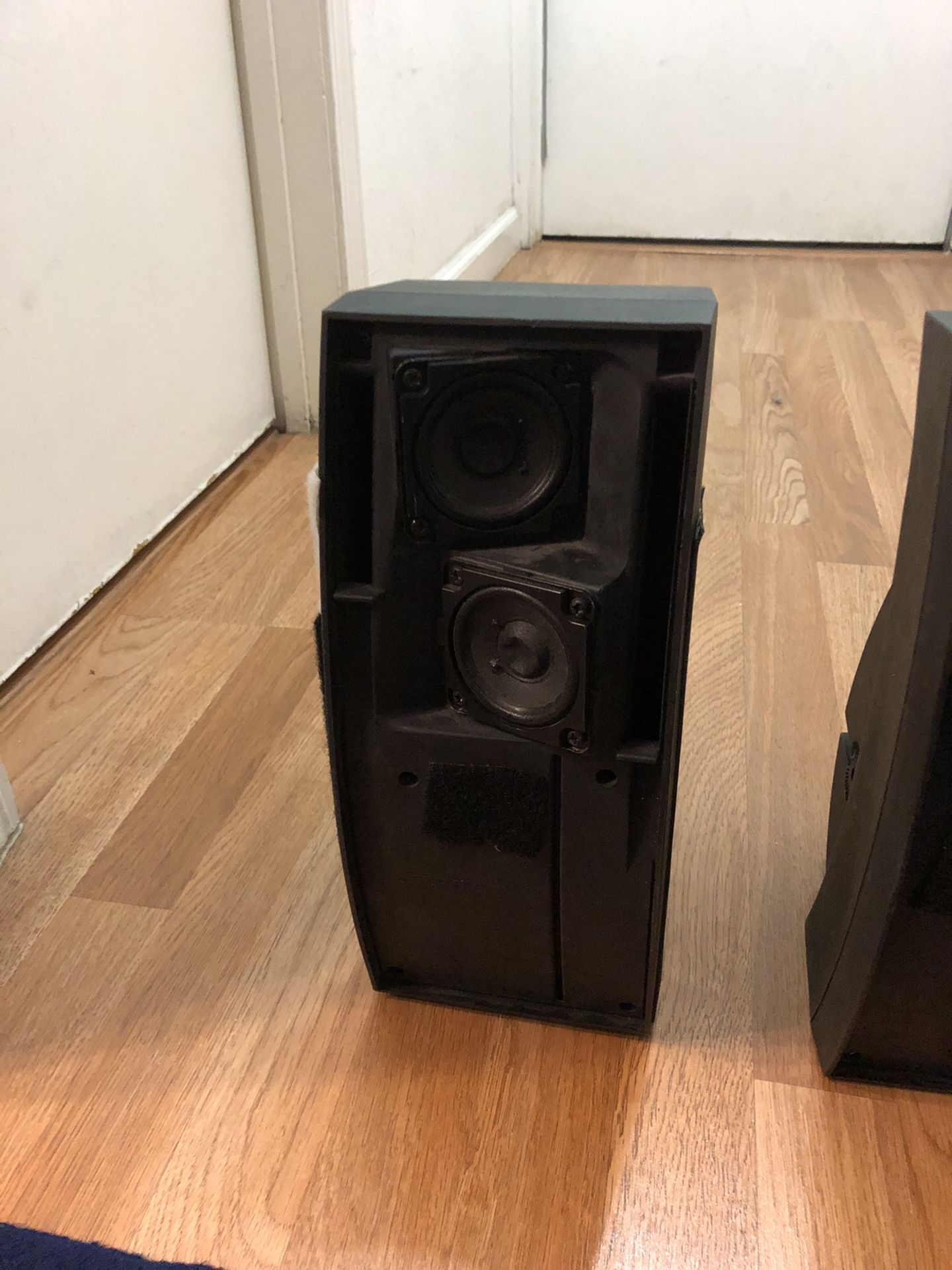Bose 302 A environmental speaker cover is missing but works great