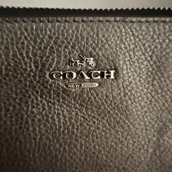 Brand New Coach handbag. Price tags and paper work inside.