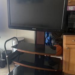 Sharp Lcd tv with tv stand  (included )