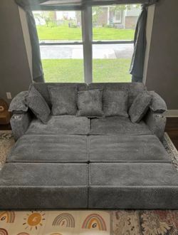 Pull out grey couch