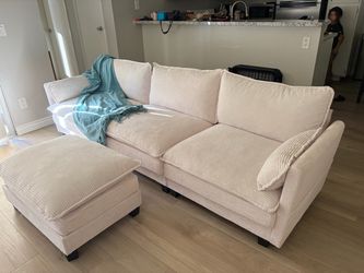 Cream corduroy sectional sofa + ottoman