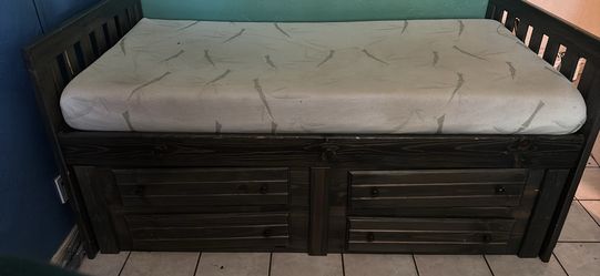 Twins Bed With Mattress. It Has 4 Drawers