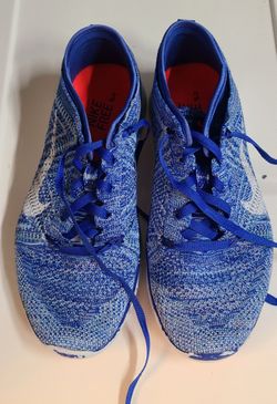 Nike Free TR Flyknit shoes in a vibrant blue colorway