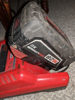 Milwaukee M28 charger and battery.