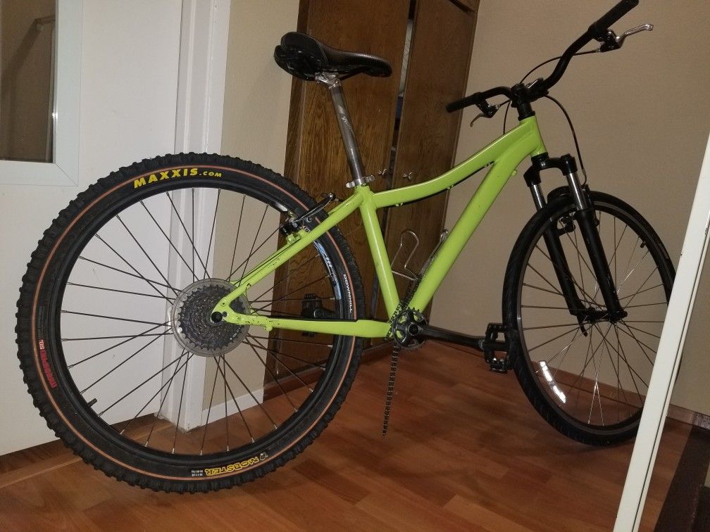 Specialized hard tail front suspension rock shocks with 26 inch mavic crossmax slr rims, SRAM 9 speed cassette, shifter and derailluer.