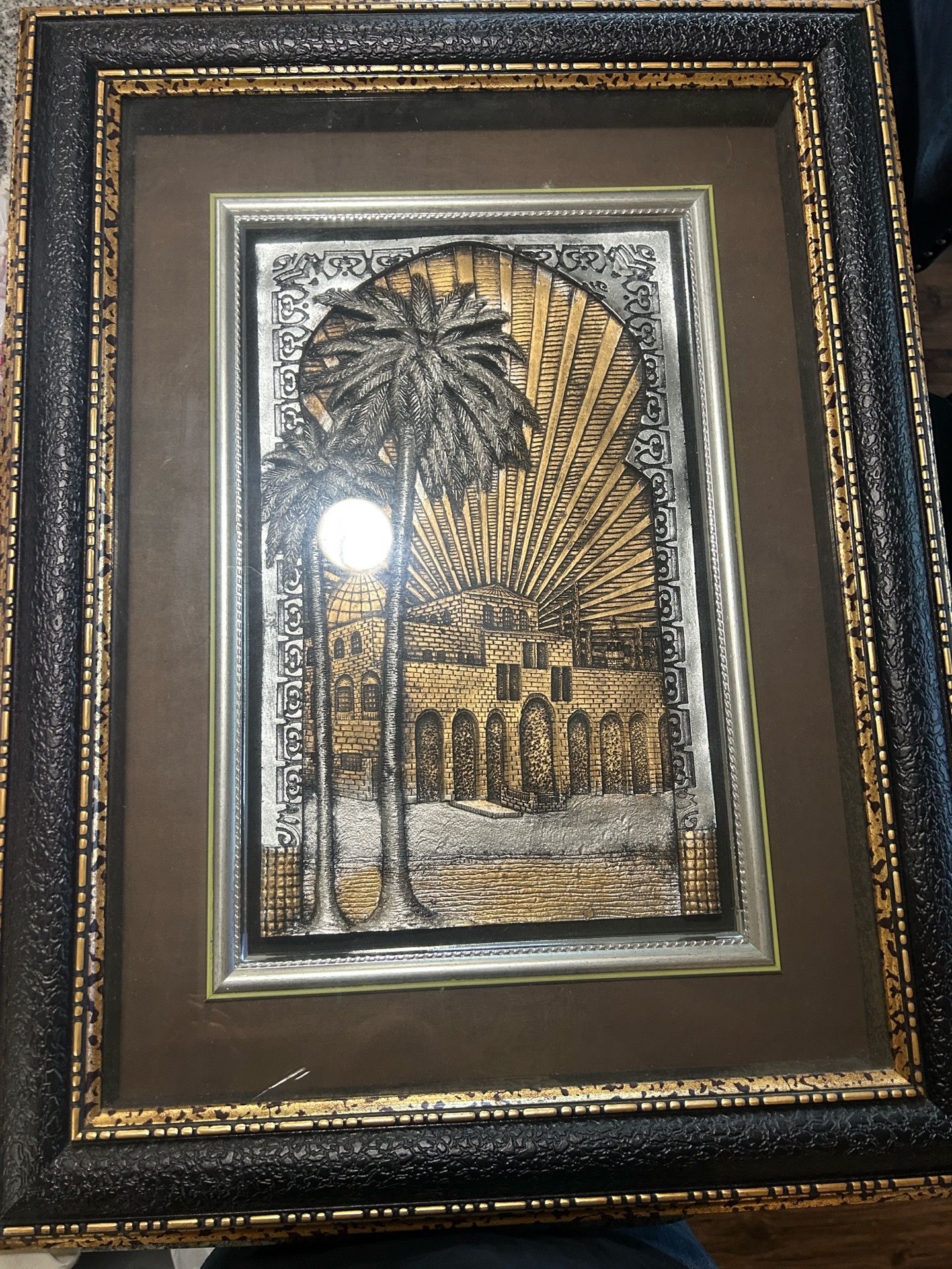 Gold and silver framed art