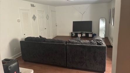 Dark grey L couch
