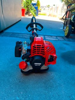 21.2 cc Gas 2-Stroke Straight Shaft String Trimmer with Rapid-Loader Trimmer Head and 16 in. Cutting Swath