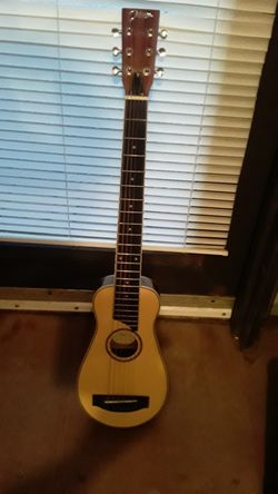 Brand New Travel Guitar And Case 