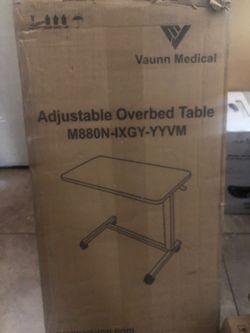 Breakfast in bed table. Adjustable over bed table
