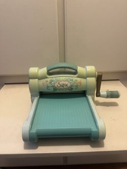 Sizzix Machine With Cutting Pads