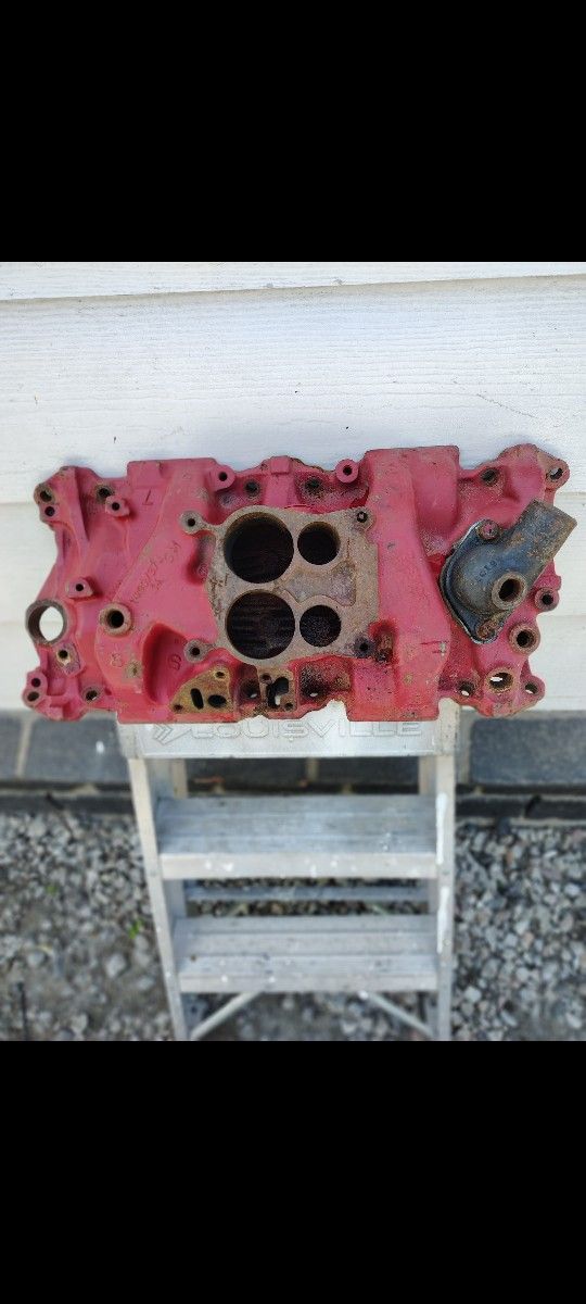 UP FOR SALE   CHEVY  350 INTAKE MANIFOLD NEEDS CLEANING  AS IS , SEE PICS FOR REFERENCE 