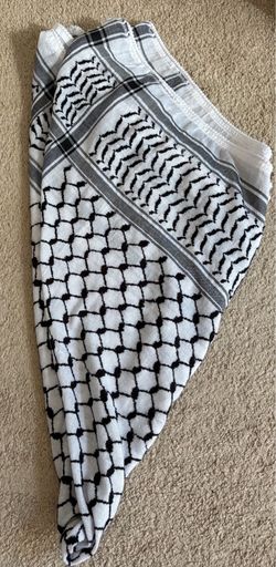 Palestine keffiyeh is a black and white cotton scarf