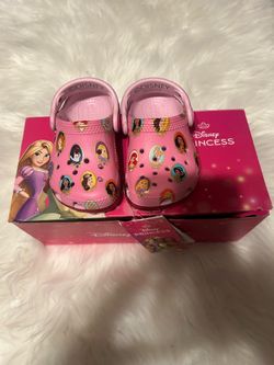 New in box pink Disney princess crocs size. 5c