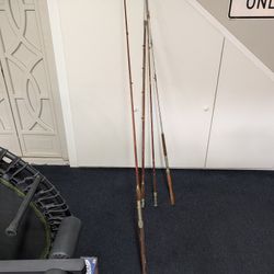 Four Vintage Fishing Poles