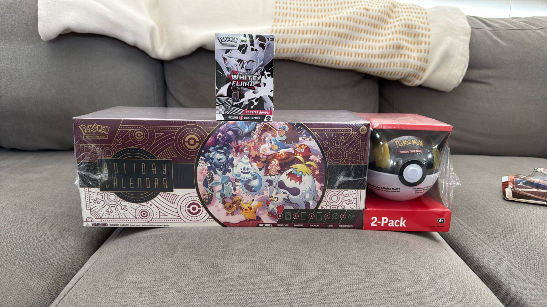 what booster packs come in the pokemon holiday calendar Pokemon main image 0