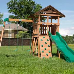 Lightning Ridge Outdoor Playground Set Wooden PlaySet w/ Wave Slide, Swing Set, and Rock Climbing Wall