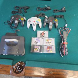 Tv & N64, 6 games, 3 controllers, 3 controller extention cords, and an up scaler