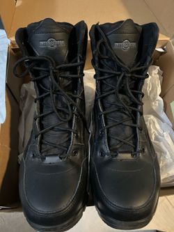 Interceptor black boots in box.