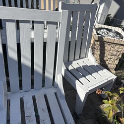 4 white wooden chairs