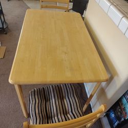 Wooden Dining table with two chairs