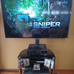 PS3 game system with 5 games and 2 controllers