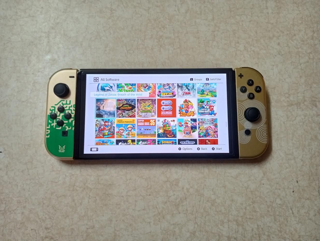 NINTENDO SWITCH OLED with 100 SWITCH GAMES and 7000 RETRO GAMES