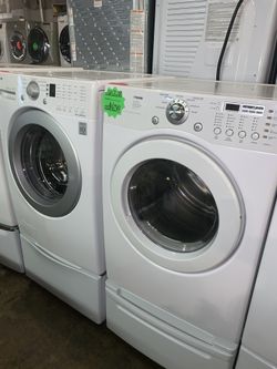 LG front load washer and electric dryer with pedestals in excellent conditions with 4 months warranty