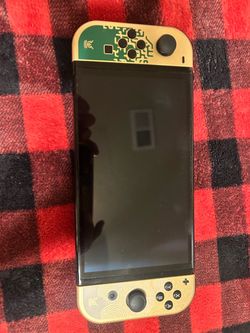Zelda Nintendo Switch Oled and a pro controller