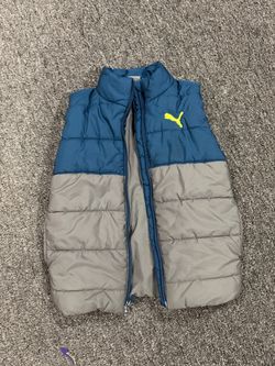 Boys blue and grey sleeveless puffy vest in a size xs(5/6)