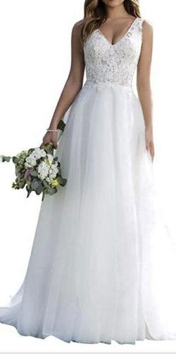 Vestido de novia, sencillo y elegante.
