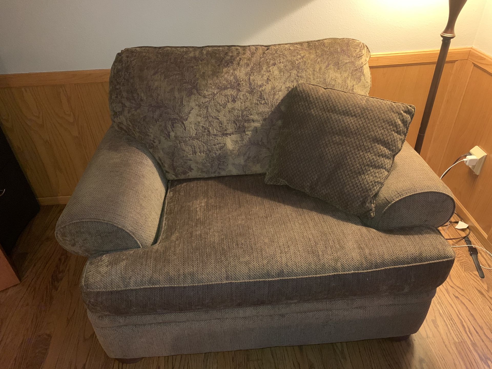 Brown oversized chair with matching ottoman
