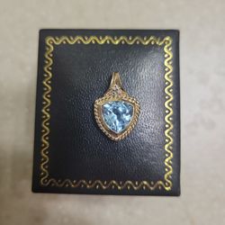 10 k gold pendant.  Weight is 2.3 grams