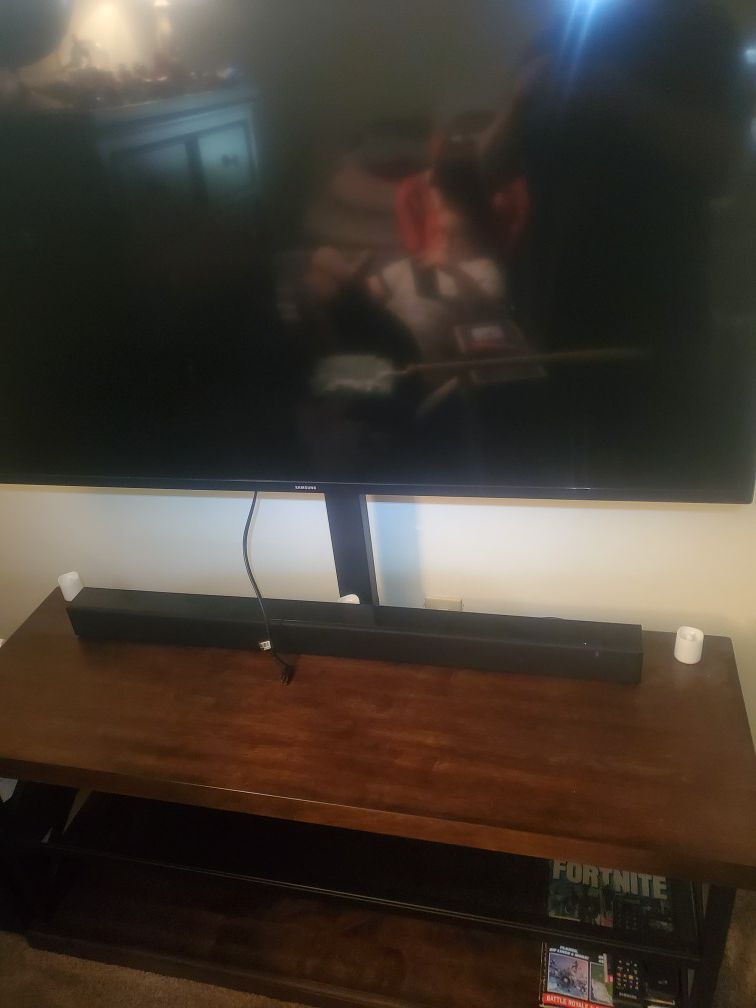Samsung 50 inch TV with stand and soundbar